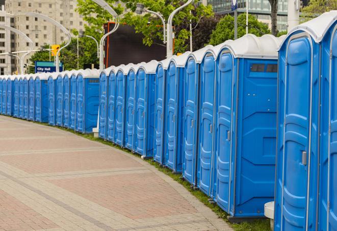 a row of portable restrooms at a trade show, catering to visitors with a professional and comfortable experience in Fair Haven